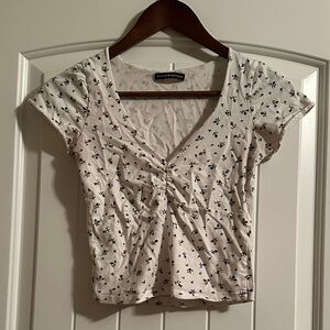 Brandy Melville Cream and Black Floral Top
